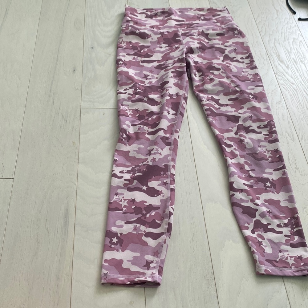 Cute different shades of pink camouflage with stars